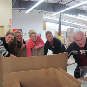 Volunteers helping pack Volunteers helping pack